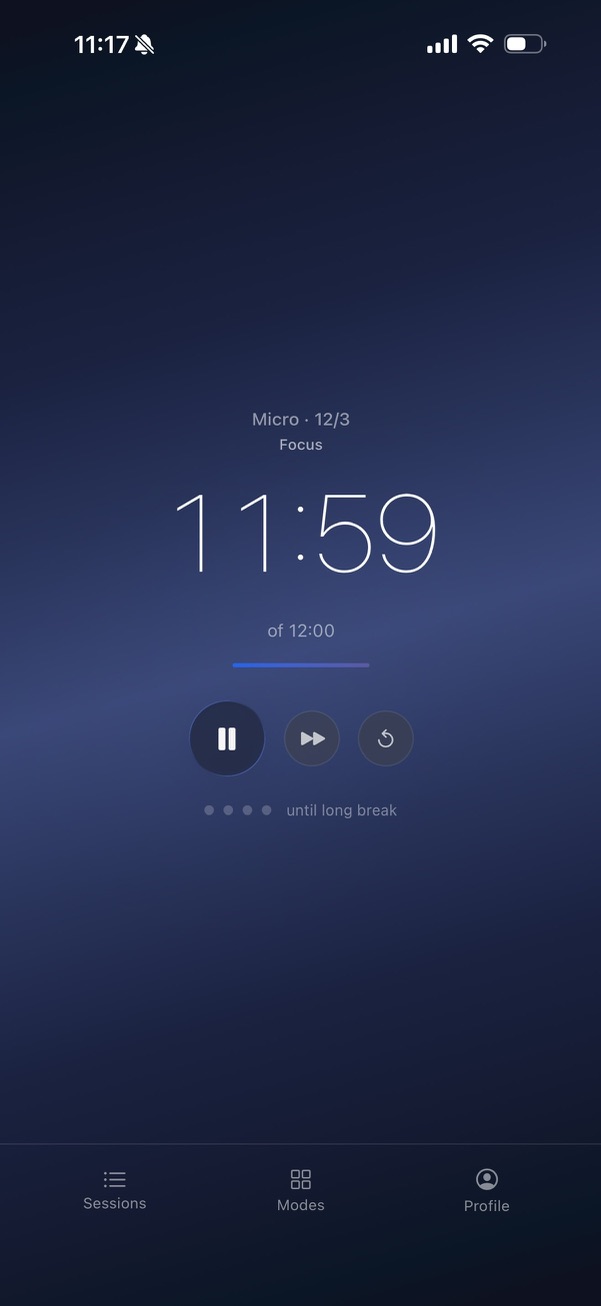 TruePace iOS — Micro mode running at 11:59 of 12:00, deep navy gradient background, lightweight 200-weight numerals, gradient progress bar under the time. Pause / skip / reset are circular thumb-sized controls; the "until long break" pip row shows position in the cycle ::border