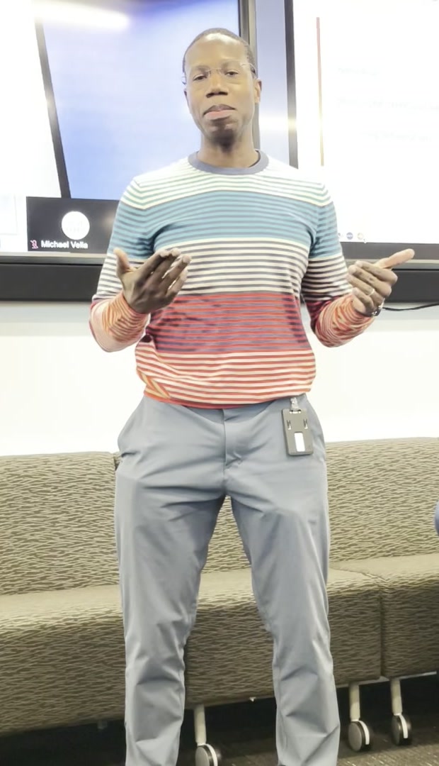 Tyrone Ross speaking to a room at an enterprise briefing